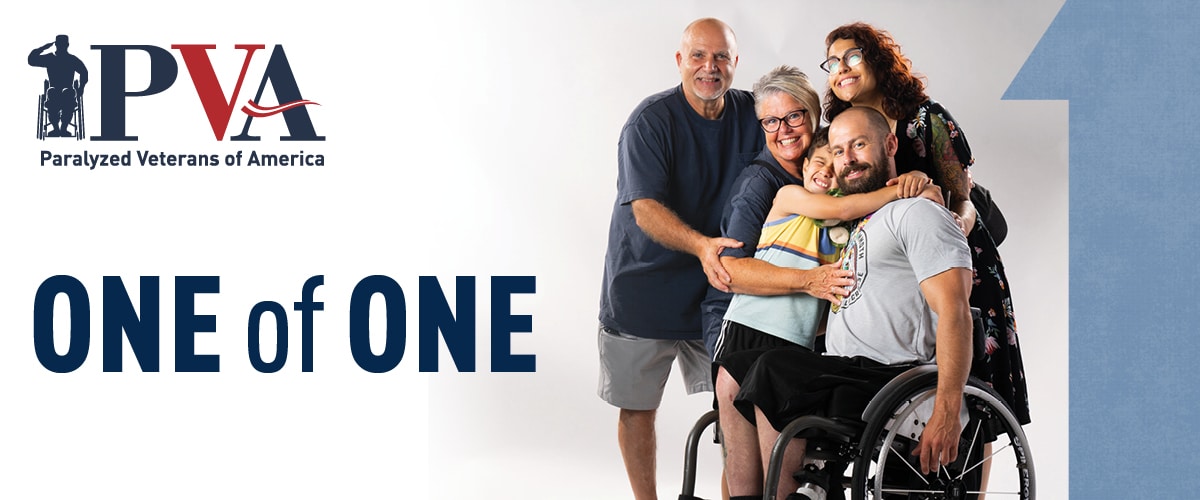 Five people, including a man in a wheelchair, smile and hug. The Paralyzed Veterans of America (PVA) logo appears with the text “ONE of ONE” on a white background.